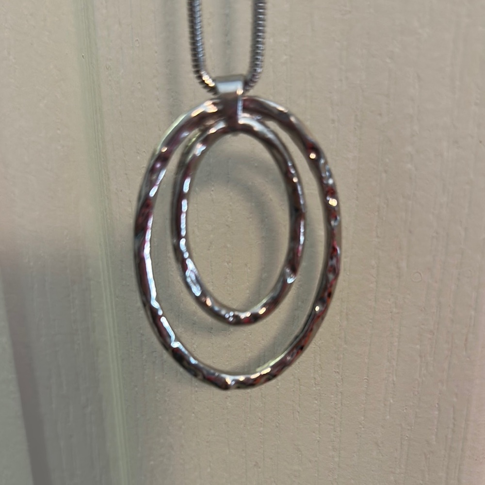 Elegant Silver Necklace with Double Ring Pendant